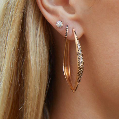 stacked with coordinating hinged huggie hoops<br>and our diamond floral studs<br>shop the look > contrast splendor <span class='visuallyhidden'>Call, text 323-404-2959 for shopping help.</span>